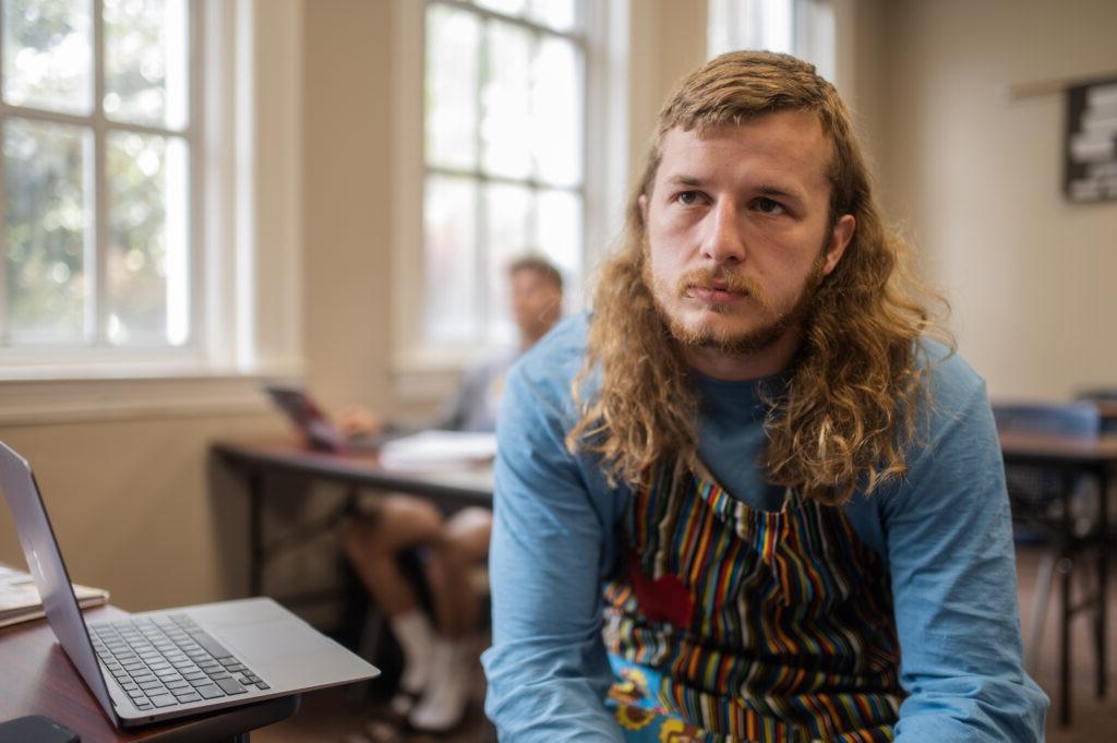 student looks up in class